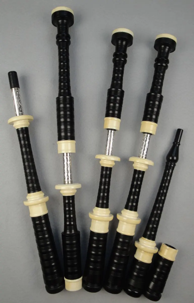 Henderson, Mid- to Late-1950s, Full Ivory with Engraved Silver Slides