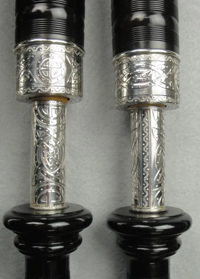 engraved silver bagpipes
